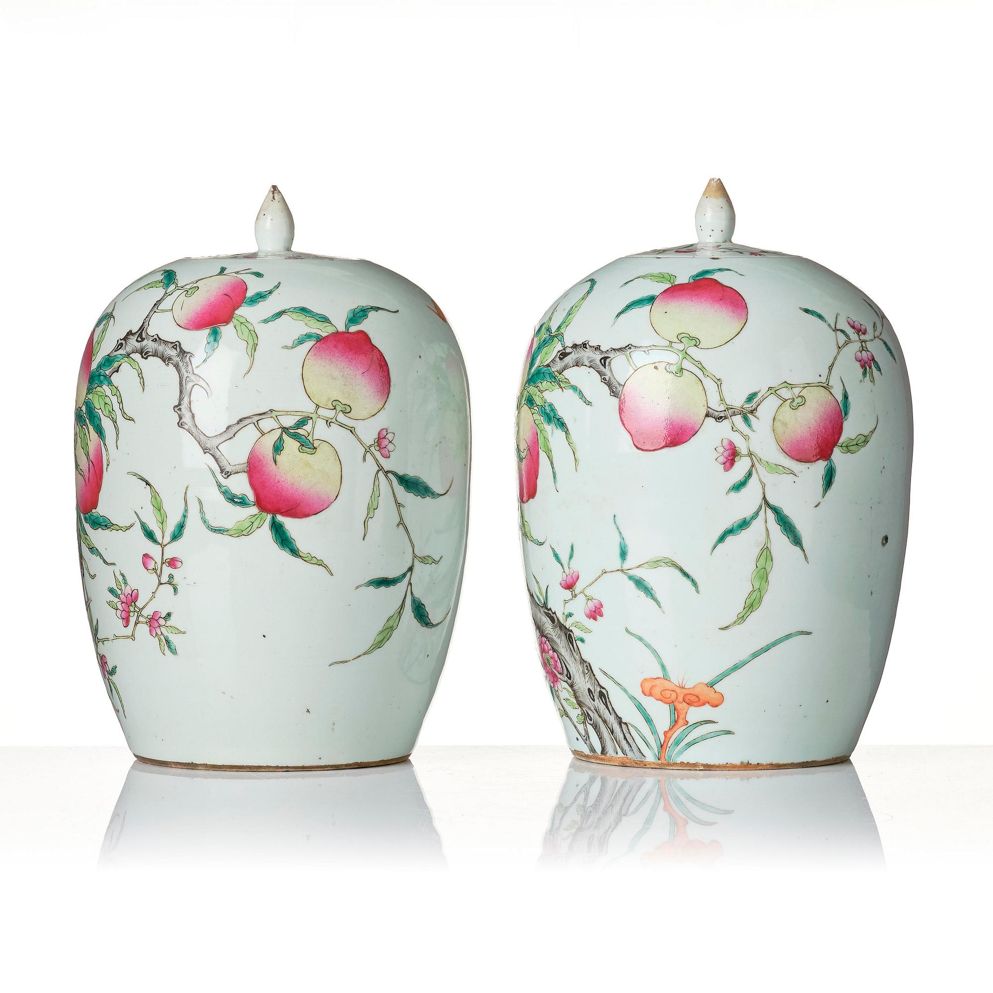 A pair of famille rose 'peaches' jars with cover, Qing dynasty, circa 1900.