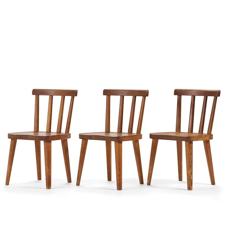 Axel Einar Hjorth, a set of three stained pine "Utö" chairs, Nordiska Kompaniet, Sweden, 1930s.