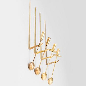 A set of four wall sconces by Pierre Forsell, Skultuna.