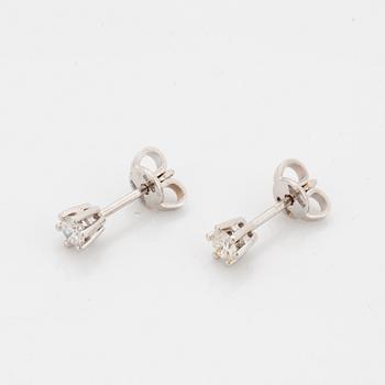 Brilliant-cut diamond earrings.