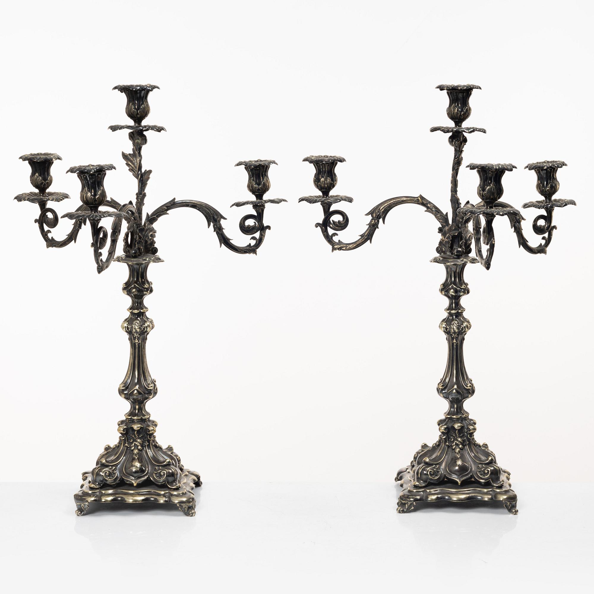 A pair of silver plated Rococo style candelabra, 20th century.