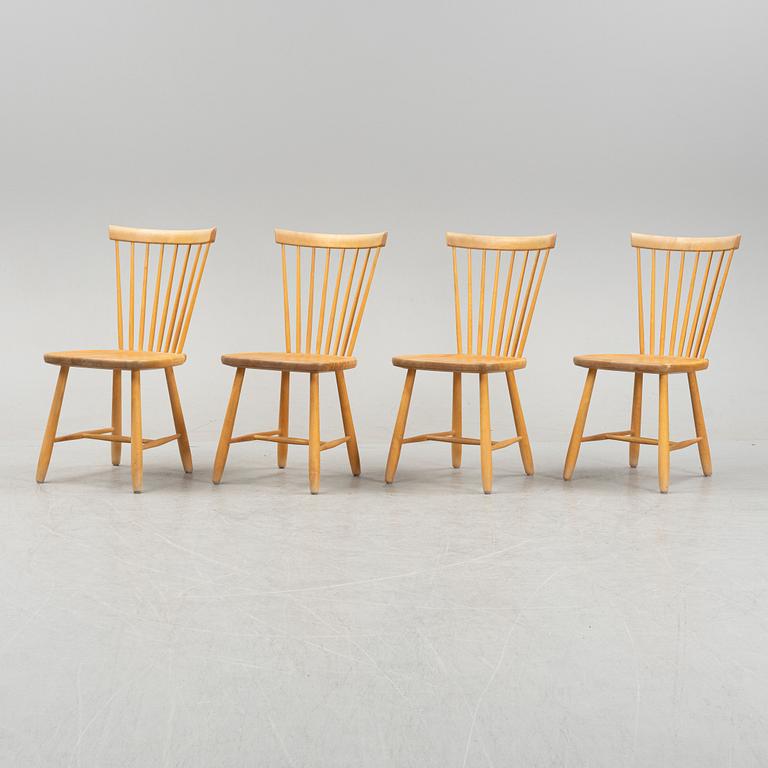 A set of four 'Lilla Åland' birch chairs by Carl Malmsten for Stolab dated 2000.