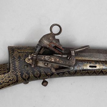 A Persian snaphaunce rifle, 18th century.