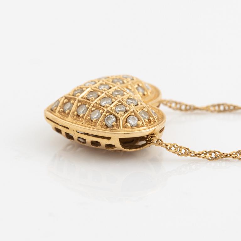 Heart shaped diamond necklace, 18K gold and diamonds.