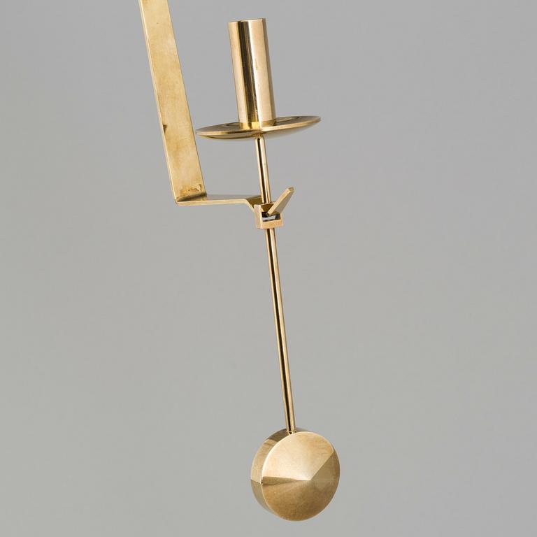 A pair of 20th century brass wall candleholders "Pendel" design Pierre Forssell for Skltuna, Sweden.