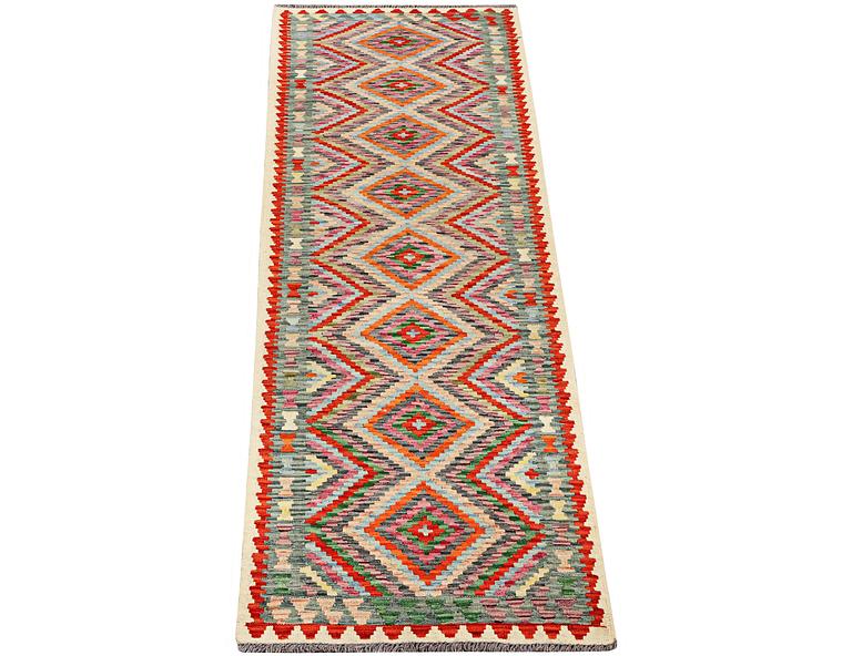 A runner carpet, Kilim, c. 298 x 79 cm.