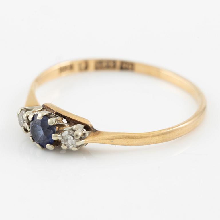 Ring, 18K gold with a small sapphire and octagon-cut diamonds.