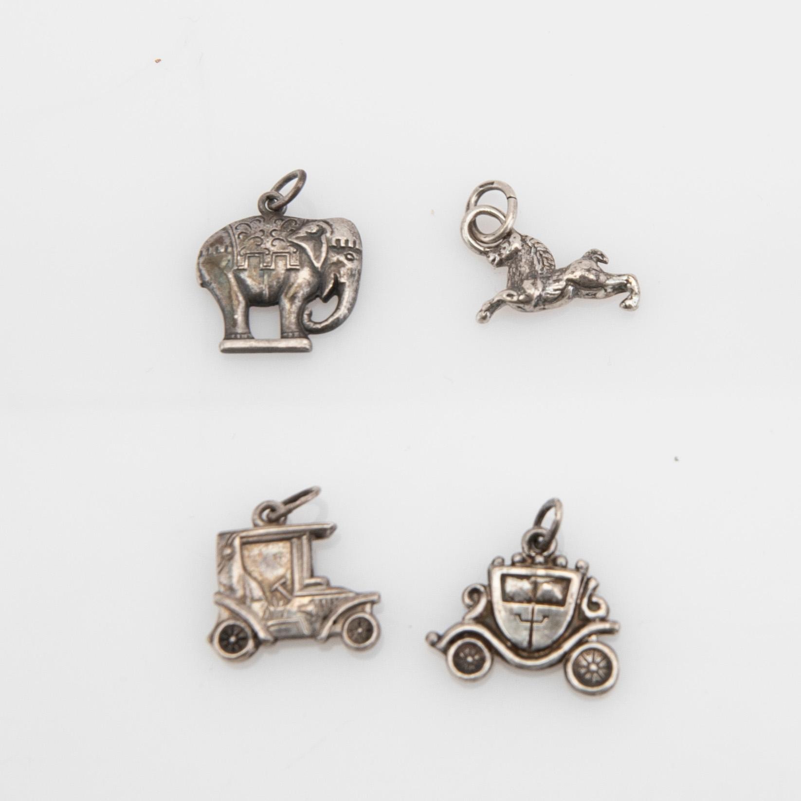 Bordsdekorationer och berlocker, silver, 9 delar.