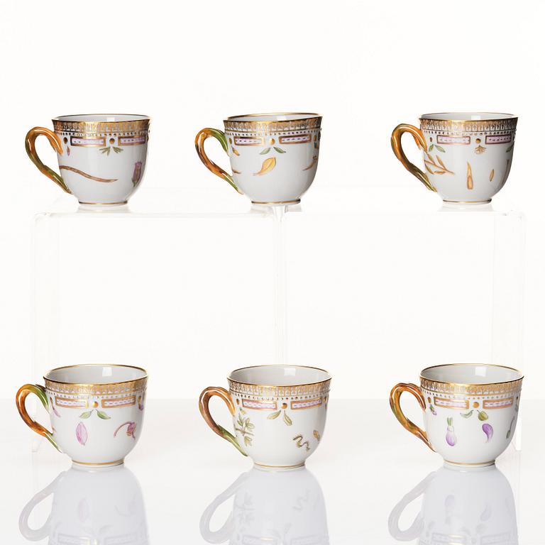 A set of 9 Royal Copenhagen 'Flora Danica' coffee cups with stands, Danmark, 20th Century.