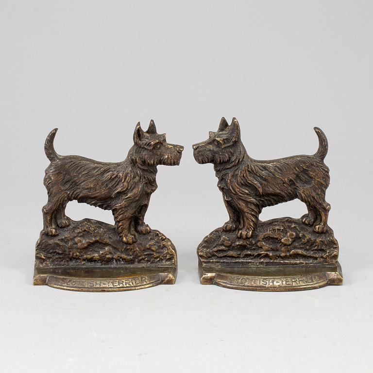 A pair of bronze 20th century book ends.