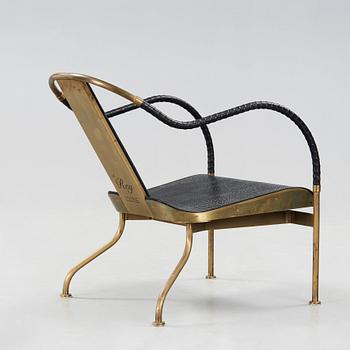 Mats Theselius, an 'El Rey' brass brass and leather easy chair, Värnamo, Sweden 1999.