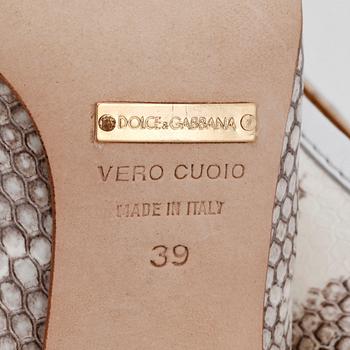 DOLCE GABBANA, a snakeskin embossed leather bag and matching shoes. Size 39.
