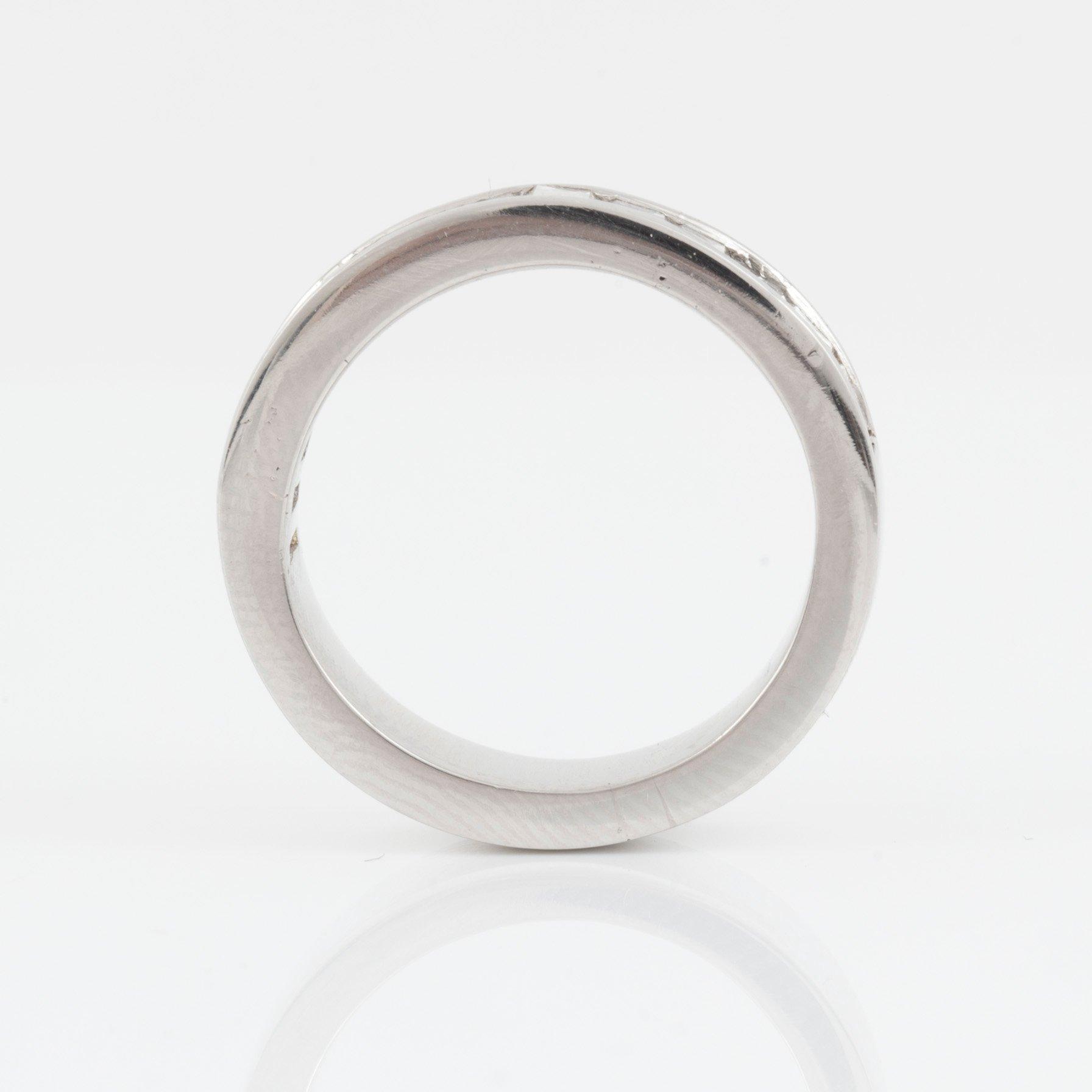 A baguette-cut diamond ring. Total carat weight circa 3.00 cts.