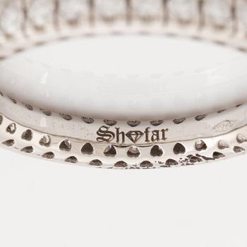 Brilliant cut diamond eternity ring.