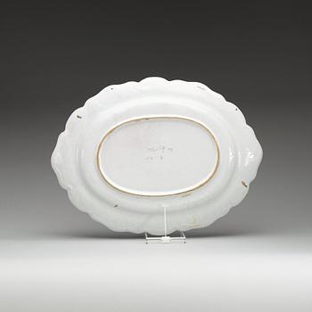 A Swedish Rörstrand faience charger, dated 11/1 (17)73.