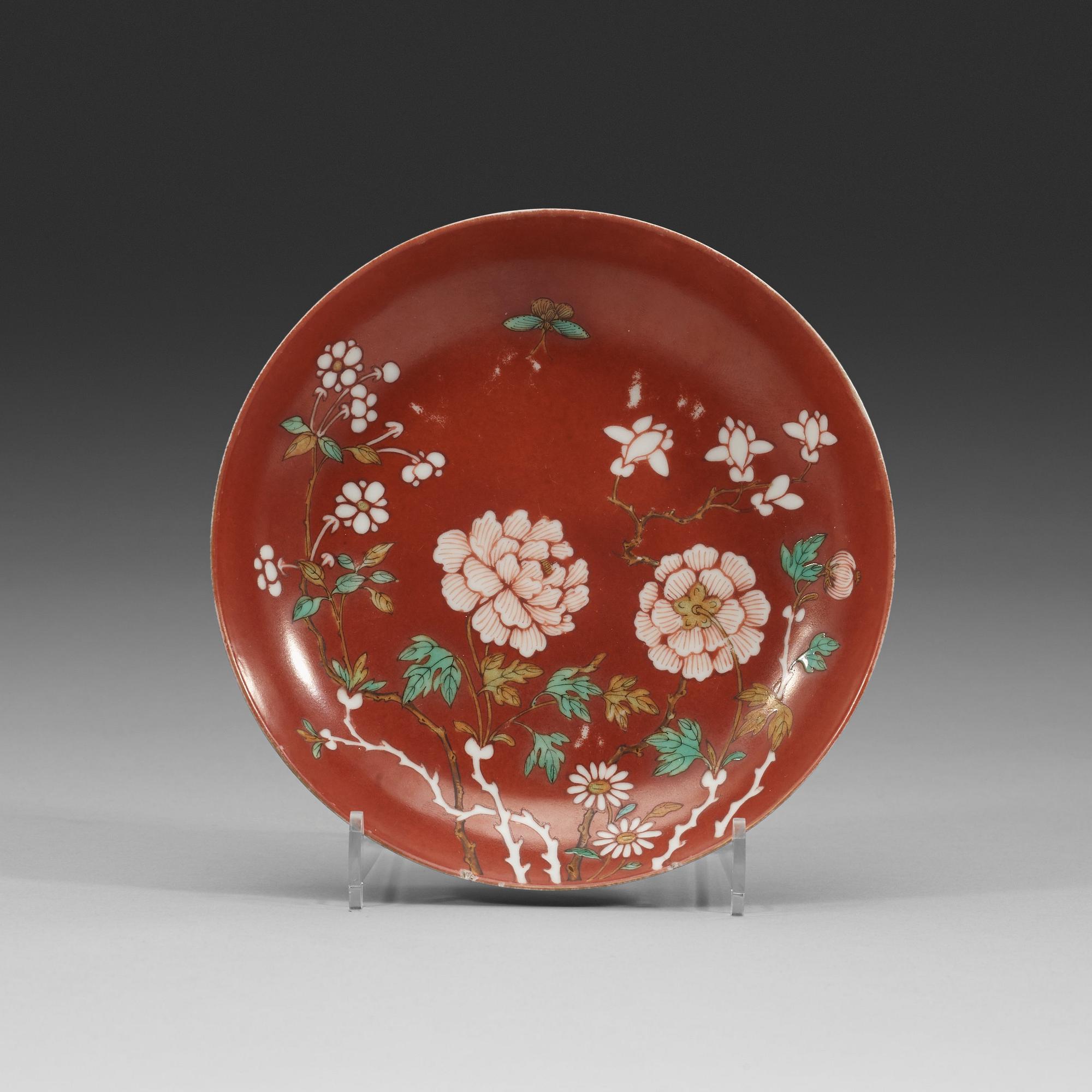 An enamelled coral-gorund dish, Qing dynasty with Daoguangs seal mark and period (1821-1850).