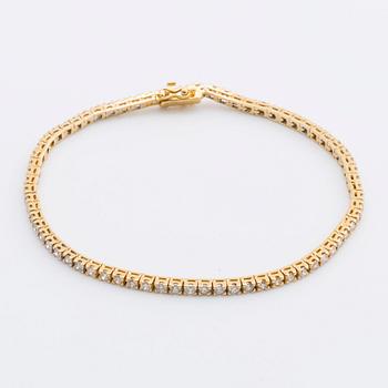 DIAMOND BRACELET 18k gold w 70 brilliant-cut dimaonds approx 3 ct in total.