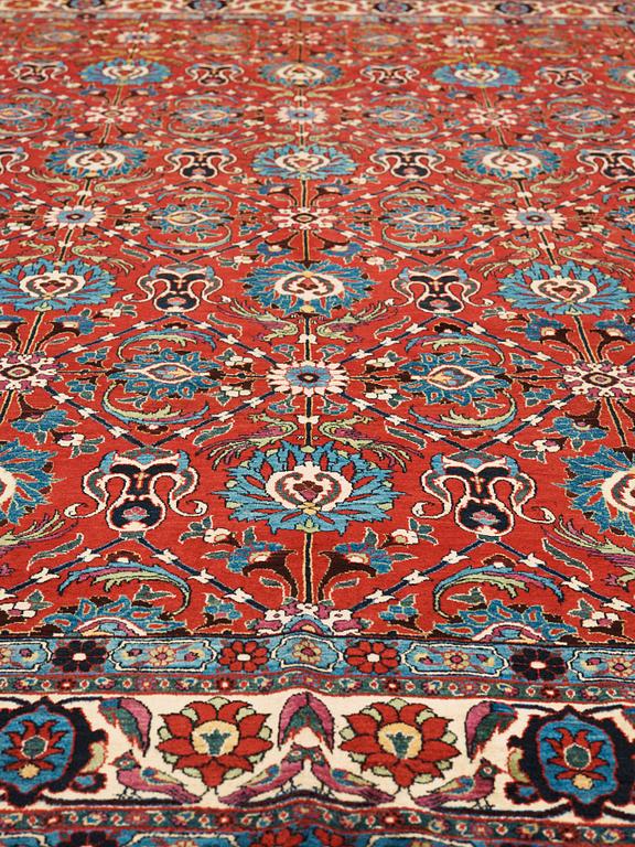 A CARPET. A semi-antique Veramin probobly. 303-311 x 208,5 cm.