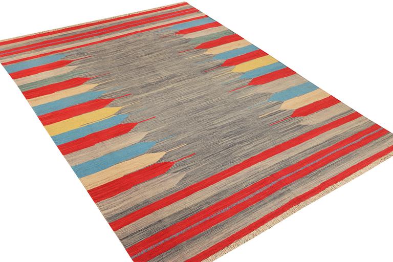 An Afghan Kilim carpet, c. 293 x 199 cm.