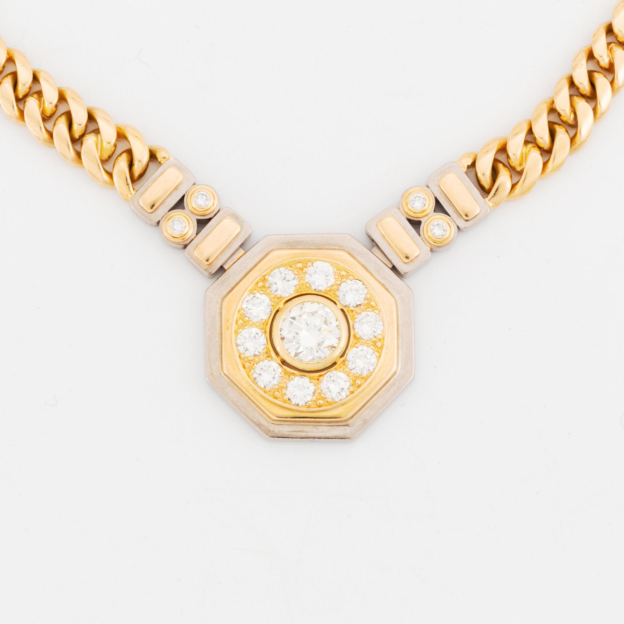 An 18K gold necklace with a round brilliant-cut diamond weight ca 1.65 cts quality ca I vs, by Jan Hellströmer.