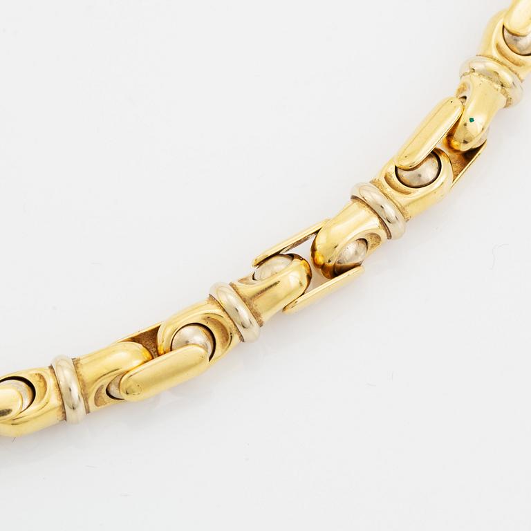 An 18K gold necklace/bracelet combination.