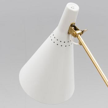 AN ADJUSTABLE FLOOR LAMP, K10-11. Manufactured by Idman Oy. Designed 1958.