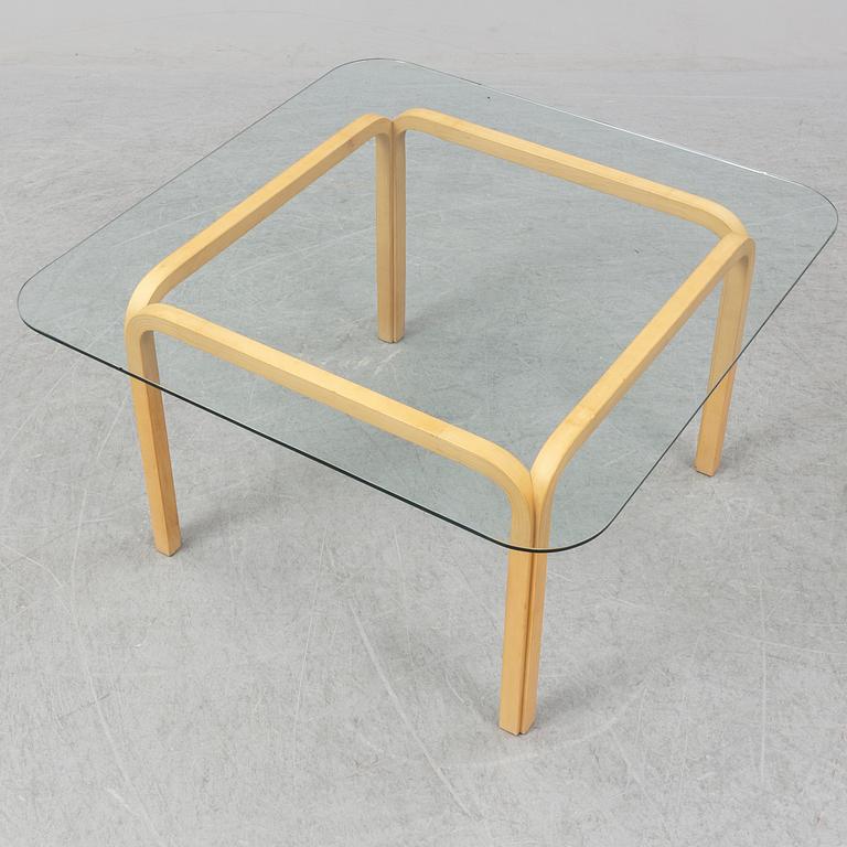 ALVAR AALTO, a model Y 805 birch coffee table from Artek, Finland.