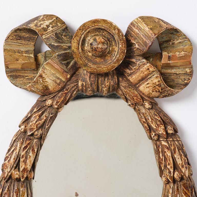 A Gustavian giltwood mirror, late 18th century.