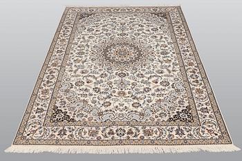 A carpet, Nain part silk so called 6 LAA, signed, ca 240 x 137 cm.