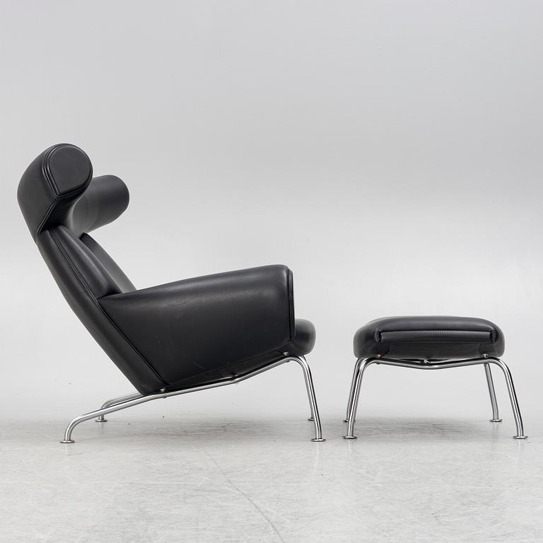 Hans J. Wegner, fåtölj med fotpall, "Ox Chair", EJ-100, Erik Jørgensen Møbelfabrik A/S, Svendborg, Danmark.