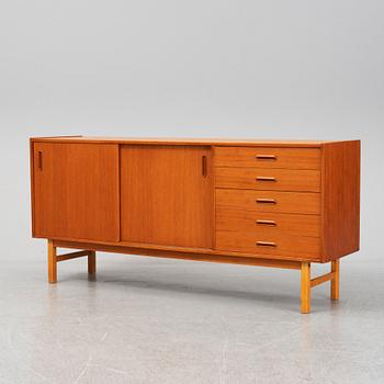 A second half of the 20th century teak veneered sideboard.