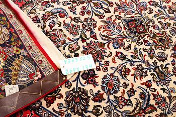 A Quum rug, c. 204 x 134 cm.