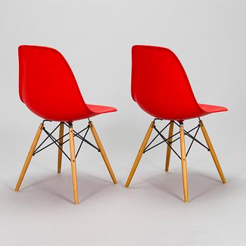 Charles & Ray Eames, two 'Plastic Chair DSW' chairs, Vitra.