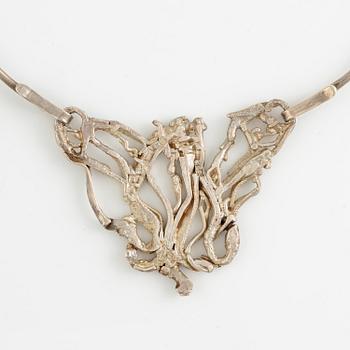 Lars Arby, three neck rings with pendants, silver, Gothenburg including 1977, 1978, and 1982.