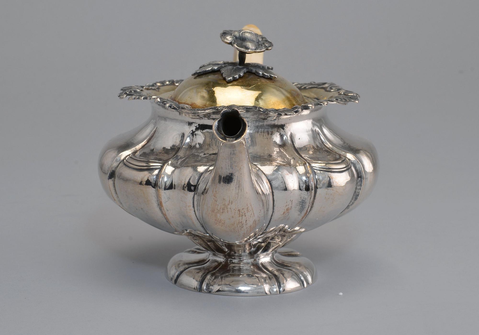 A TEAPOT, 84 silver, bone. Ivan Gubkin Moskow 1846.                         (purveyor of the court since 1855 ).