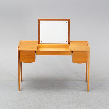 A 1960's teak dressing table.