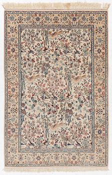 A Nain rug, part silk, figural, c. 165 x 110 cm.