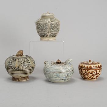 A group of four Swankhalok jars with covers, 16th/17th Century.