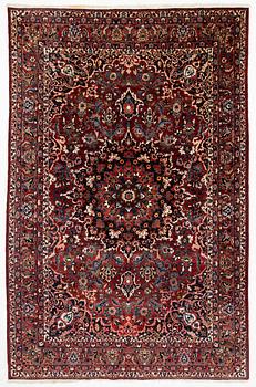 A Persian carpet. ca 400 x 260 cm.