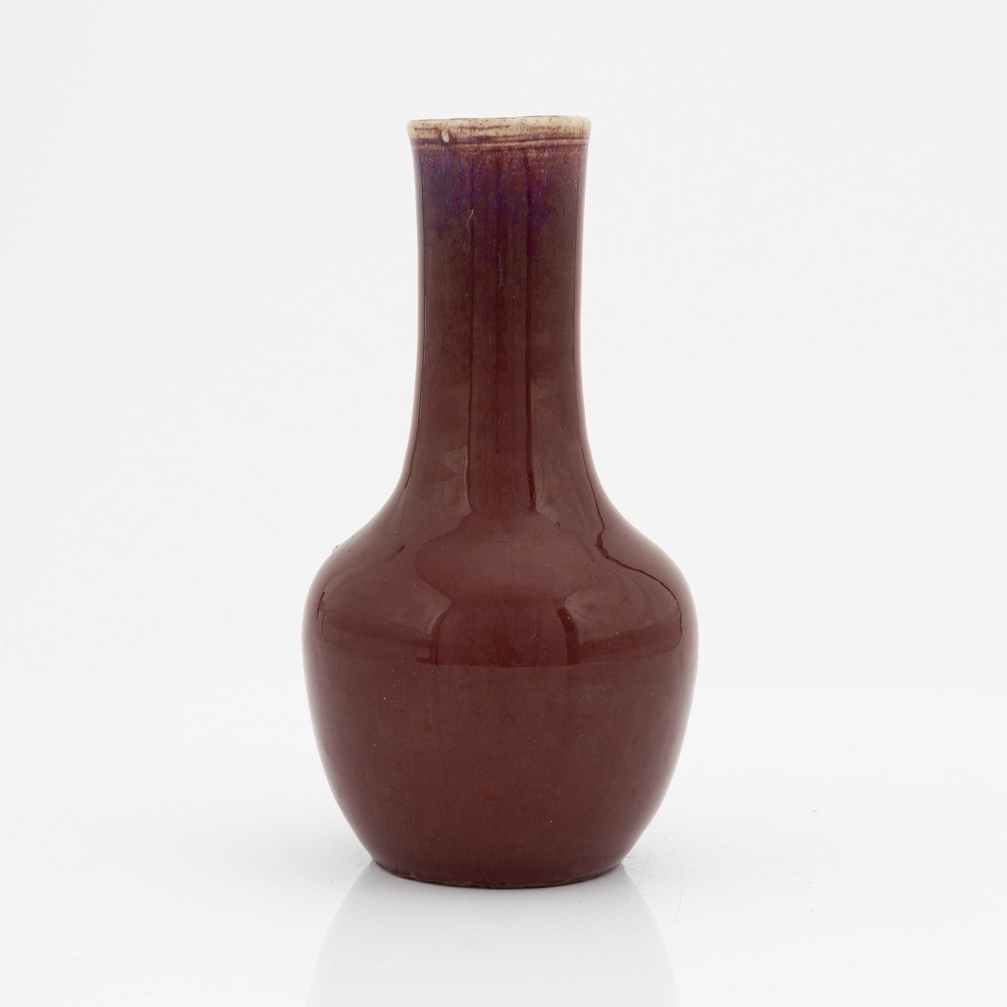 A sang de boef glazed vase, Qing dynasty, circa 1900.