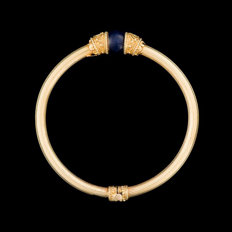 RANNEKORU, 18K kultaa, lapis lazuli. Ilias Lalaounis, Kreikka.