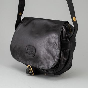 CÉLINE,a black leather handbag.