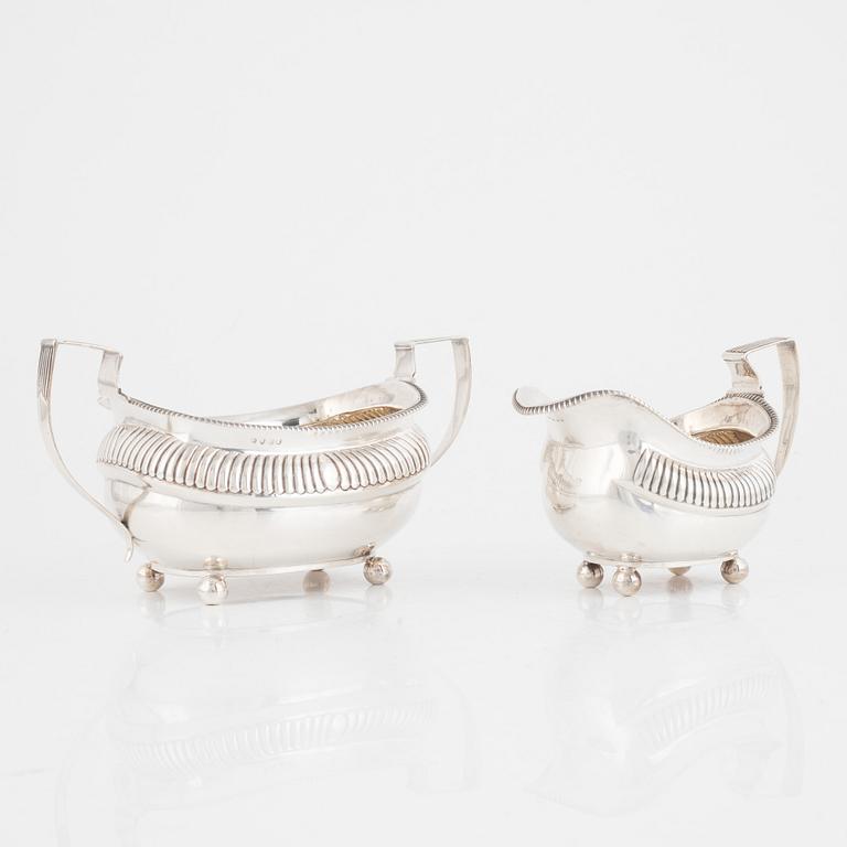 An English silver sugarbowl and a creamer, mark of Charles Fox I, London, England 1813.