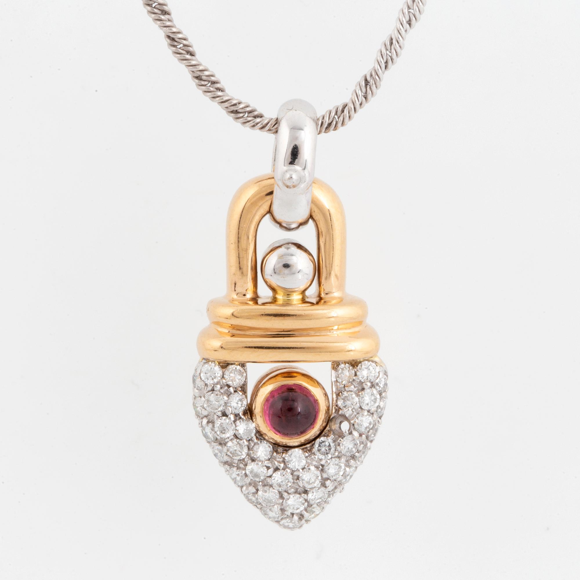 18K gold, diamond and most likey tourmaline necklace and earrings.