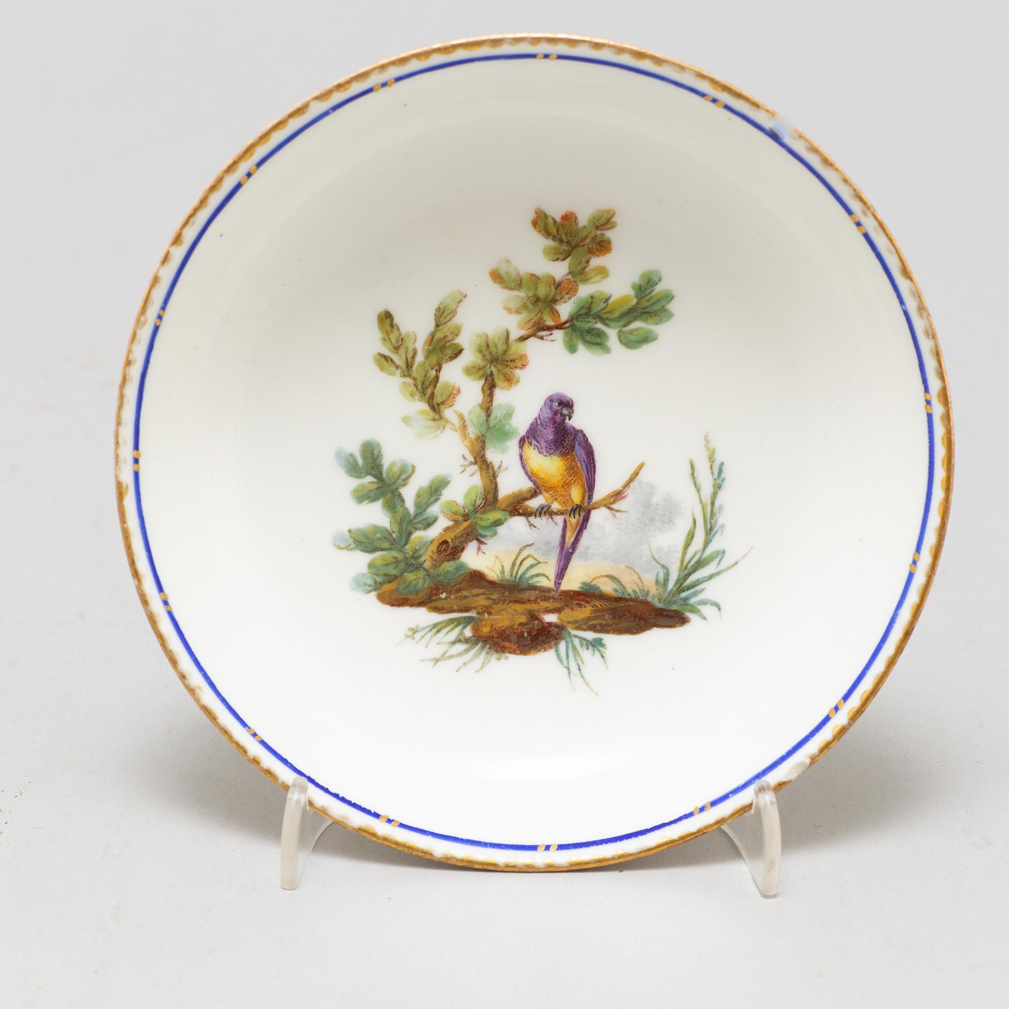 A pair of cups and saucers, "Sévrès"like mark, 19th century.