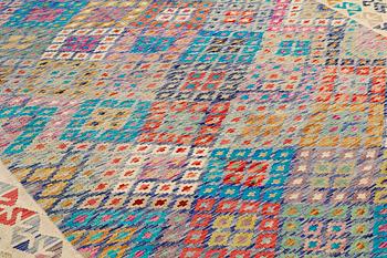 A Kilim carpet ca 295 x 253 cm.