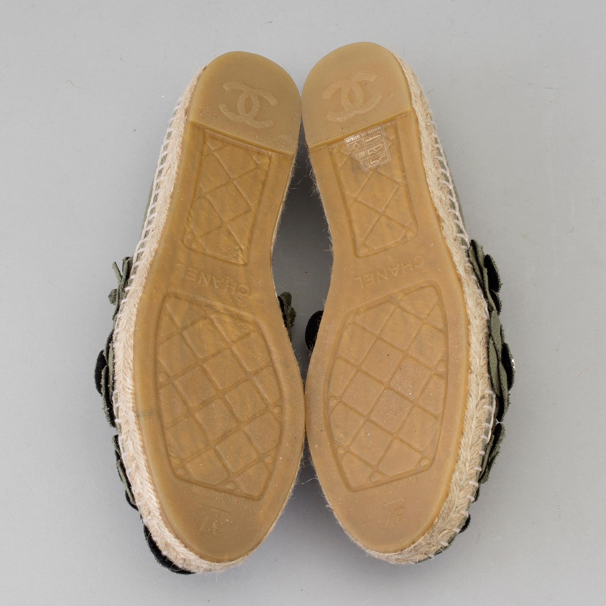 A pair of espadrilles from Chanel.