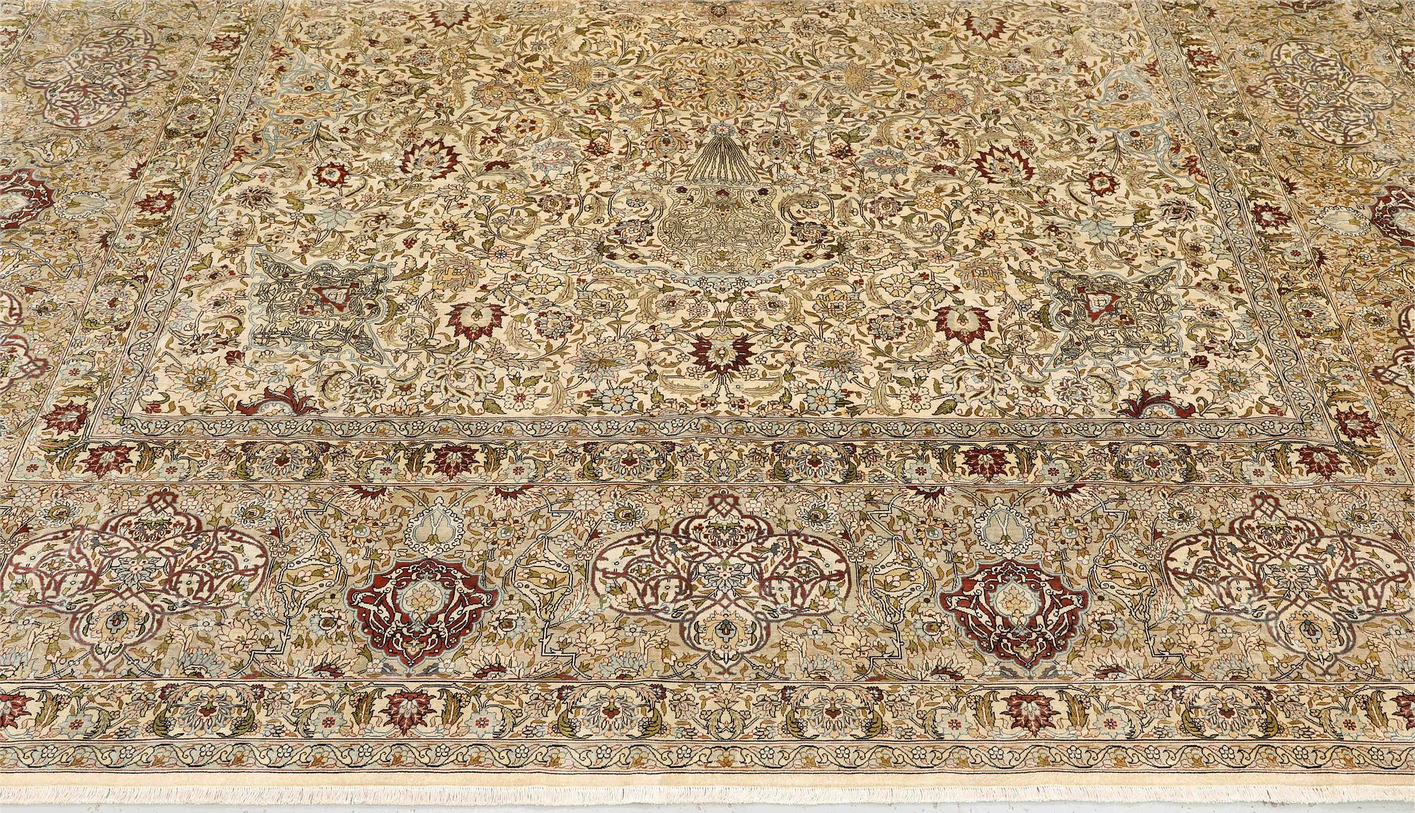 A oriental silk carpet, 350 x 247 cm.