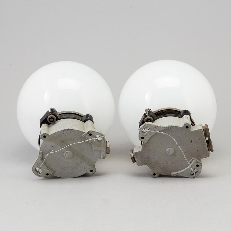 A pair of industrial wall lamps, mid 20th century.