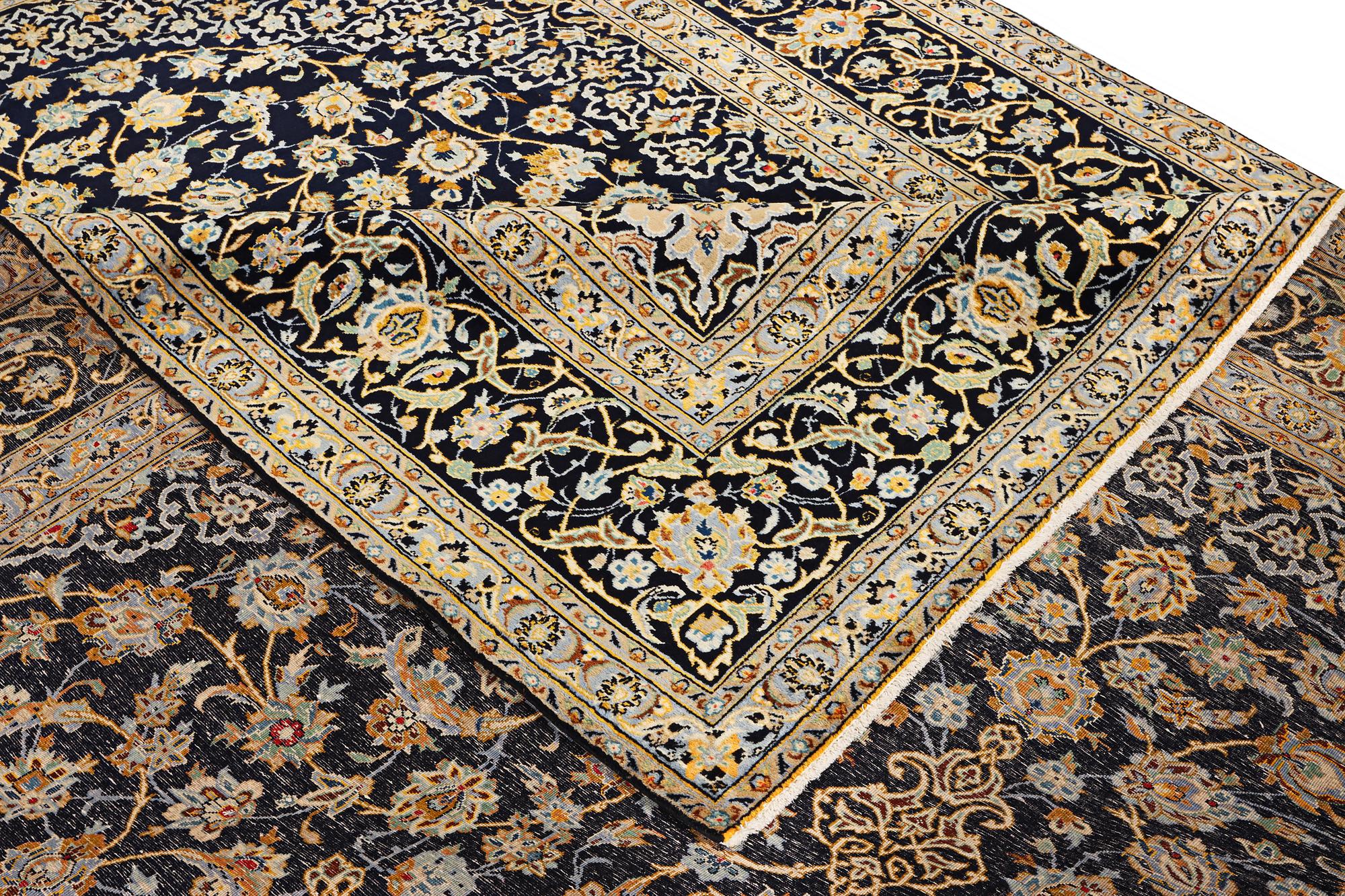 A Keshan carpet, c. 422 x 306 cm.